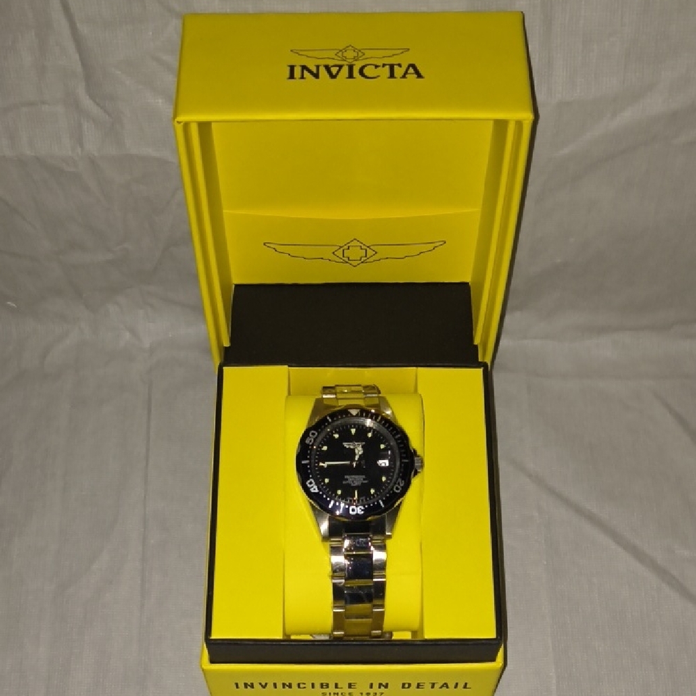 Invicta Silver and Black Watch in Yellow Box